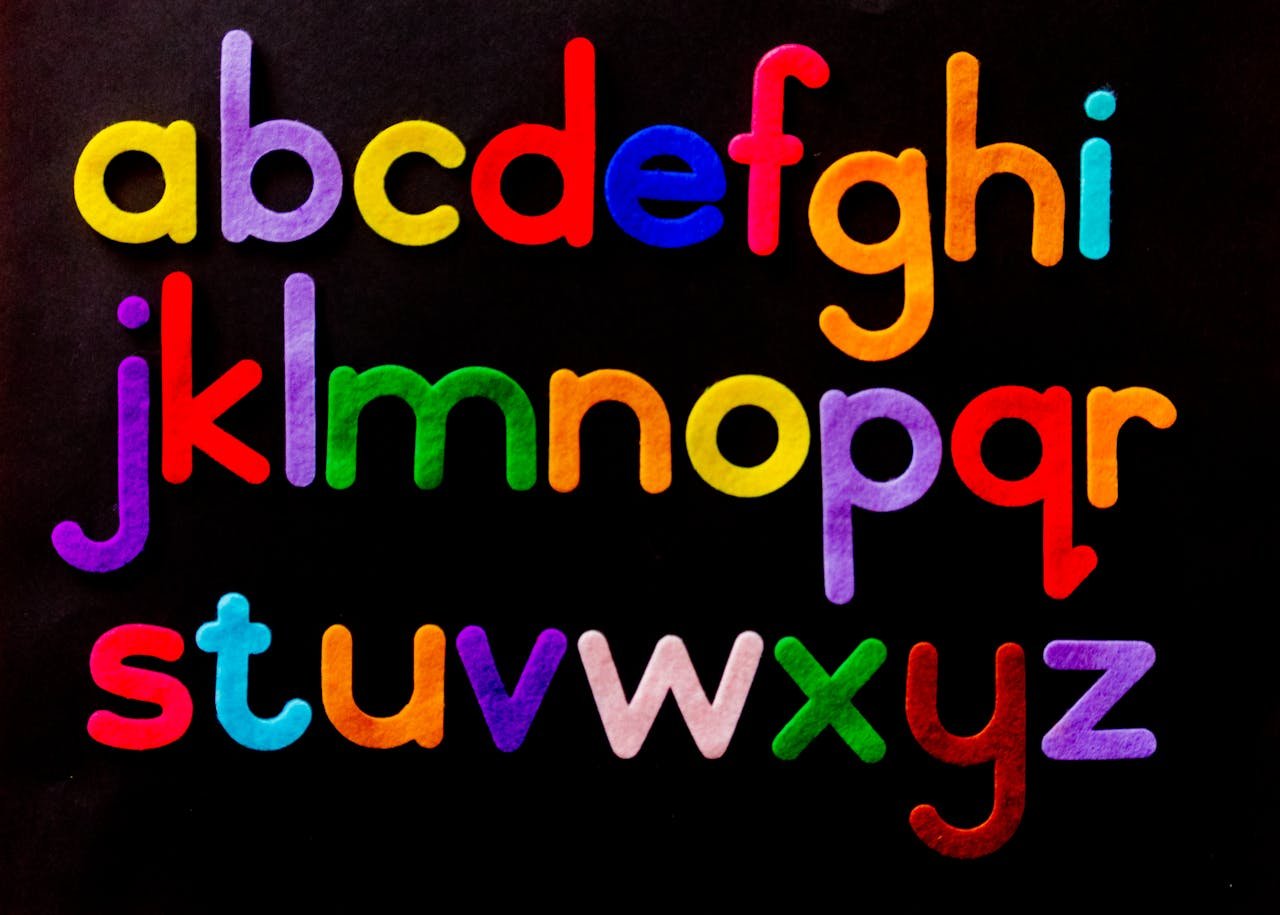 Mastering the First Impression: Your intriguing post title goes here Vibrant alphabet letters arranged against a dark background for educational use.